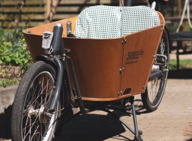 brown bicycle with trailer