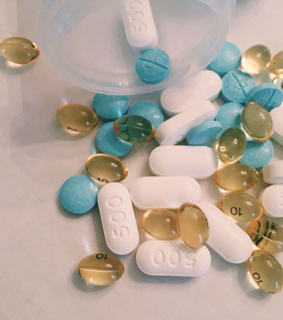 assorted-color medication pills