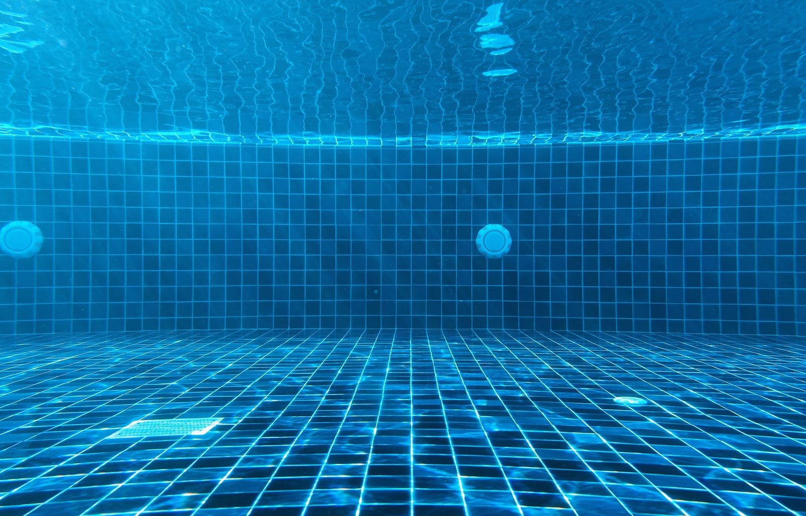 blue swimming pool with water