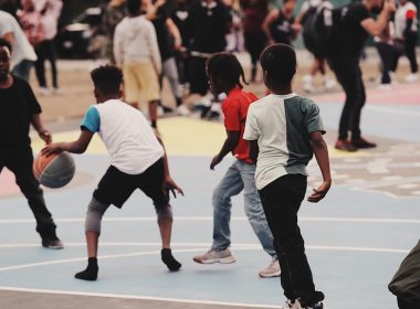 children playing street basketball