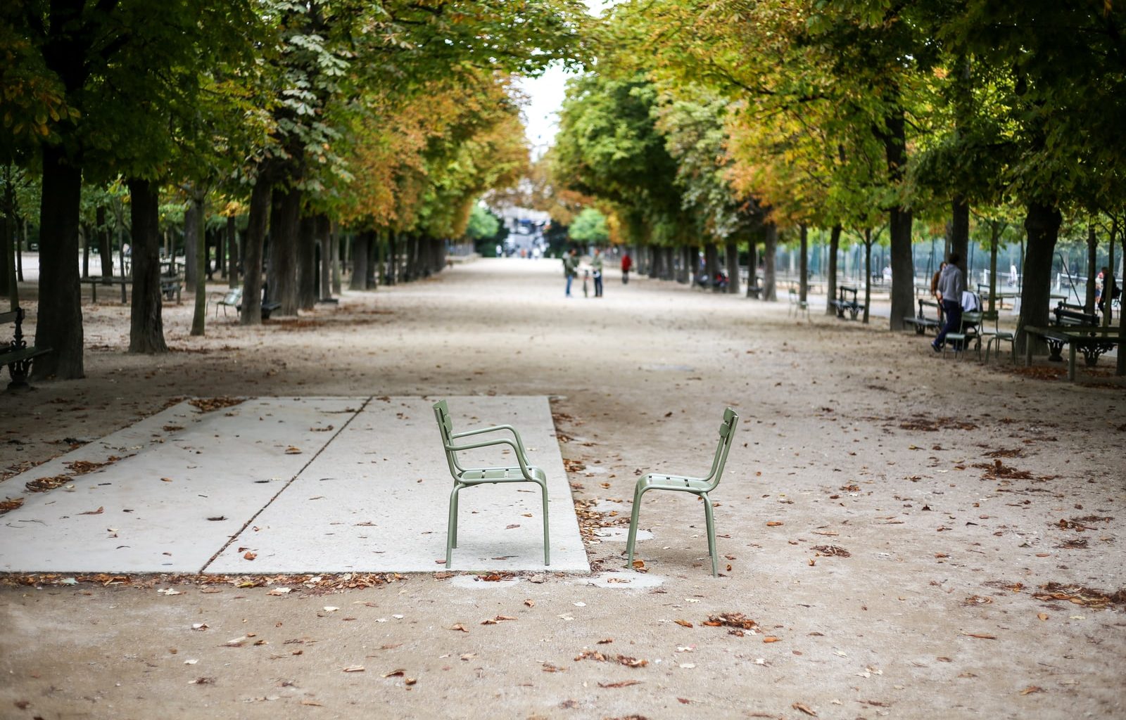 two gray chairs on road