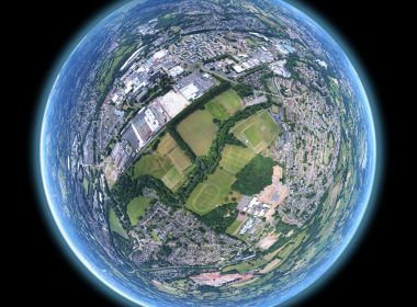 fish-eye aerial shot of buildings and trees