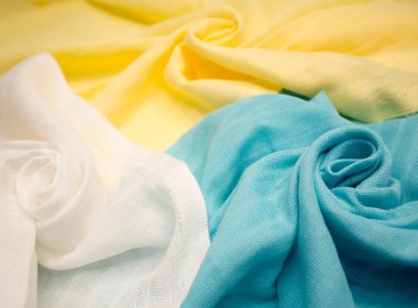 white textile on blue textile